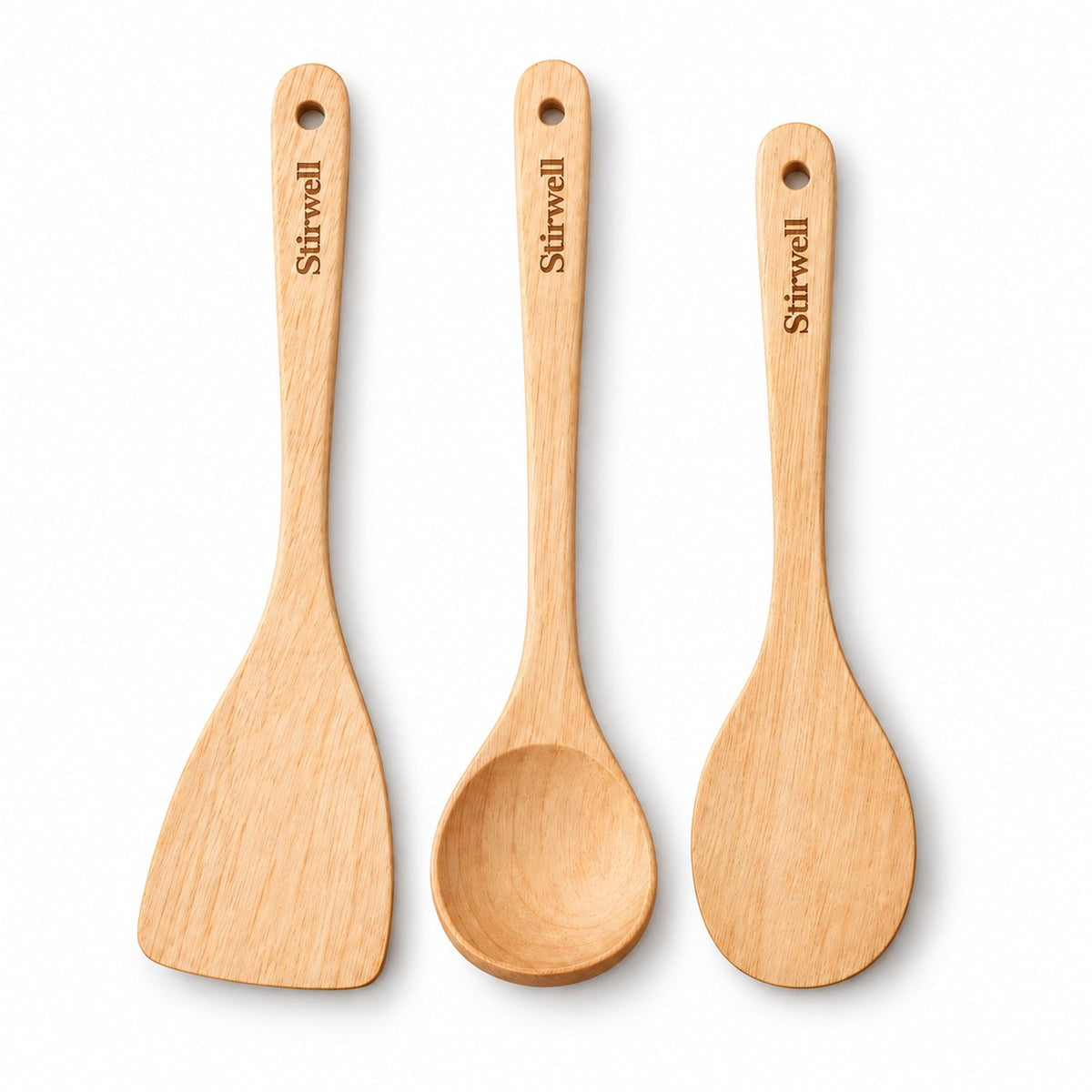 Three Stirwell wooden cooking tools on a light background